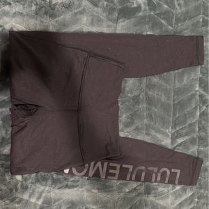 Lululemon leggings with print on the side and lululemon logo in the back size 4